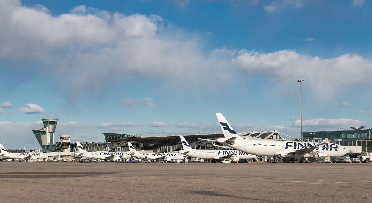 Helsinki Vantaa Airport apron and terminal at dusk