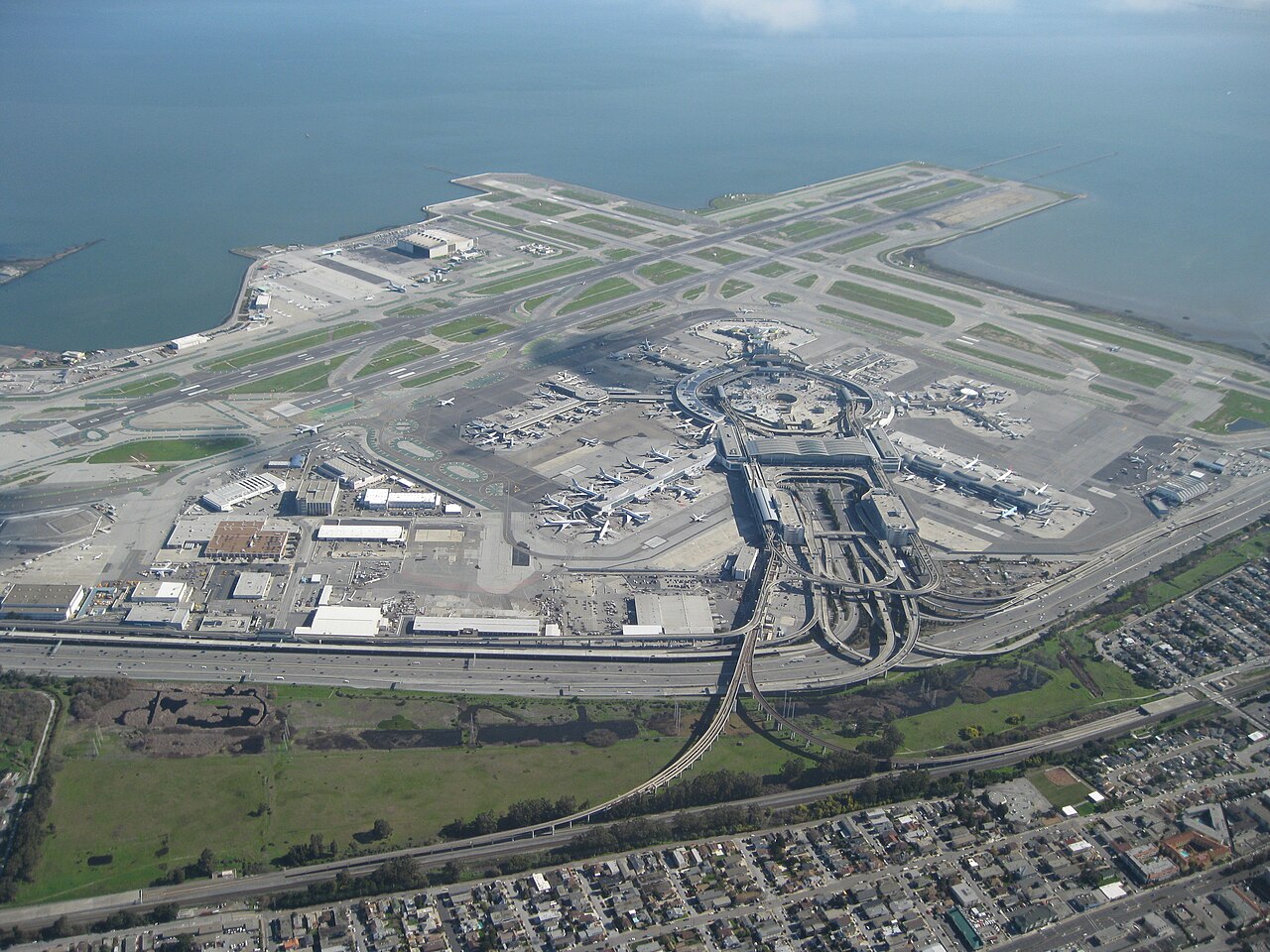Aerial view of San Francisco International Airport terminals and runways
